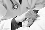 Doctor Holding Patients Hand